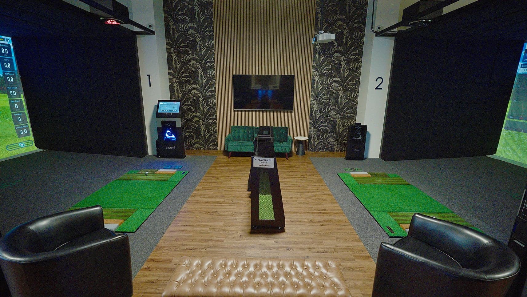Golf Envy — Symmetrical two-bay clubhouse: bays 1 and 2 either side, timber floor down the centre, gre